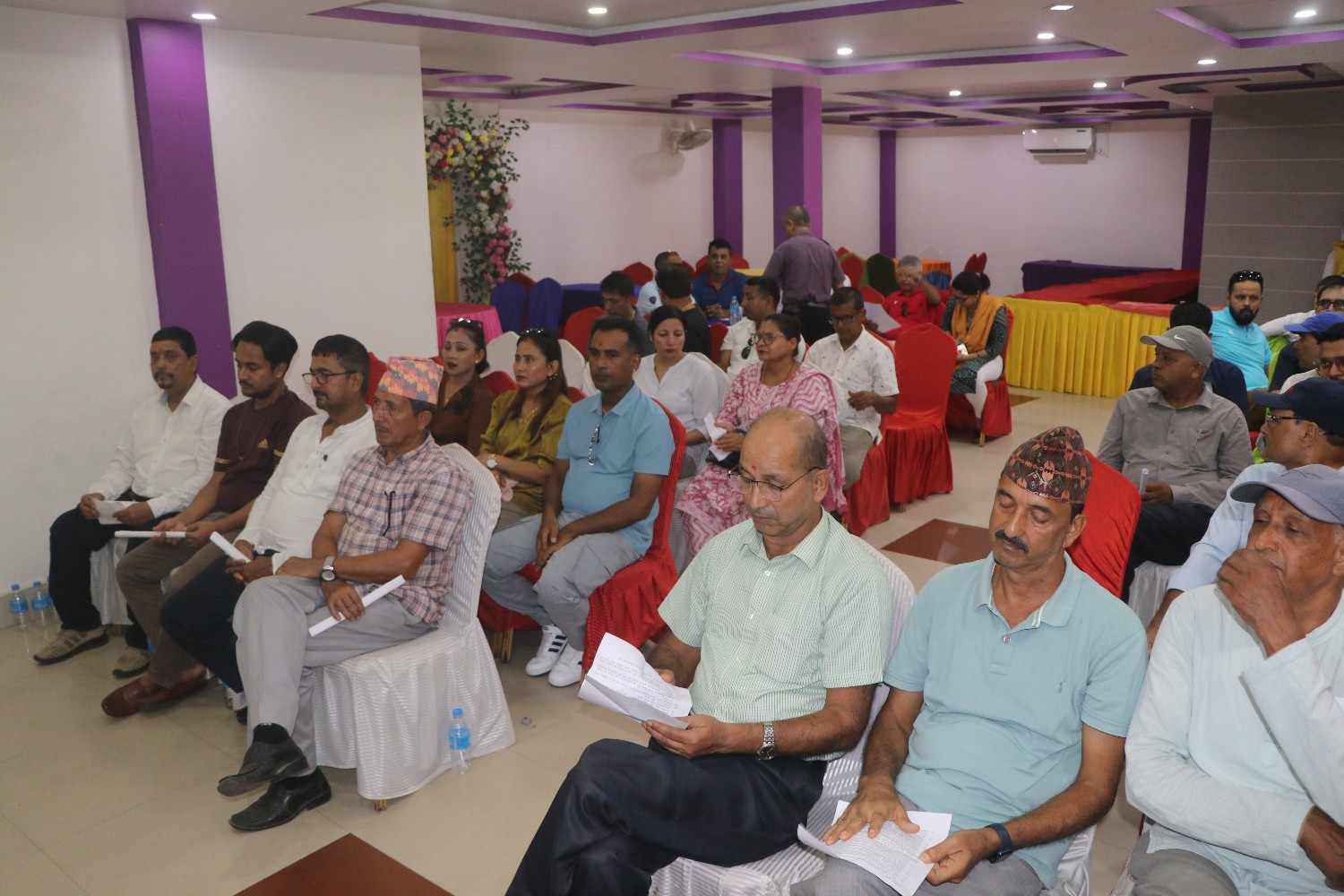 Attendees listening to the company vision presentation