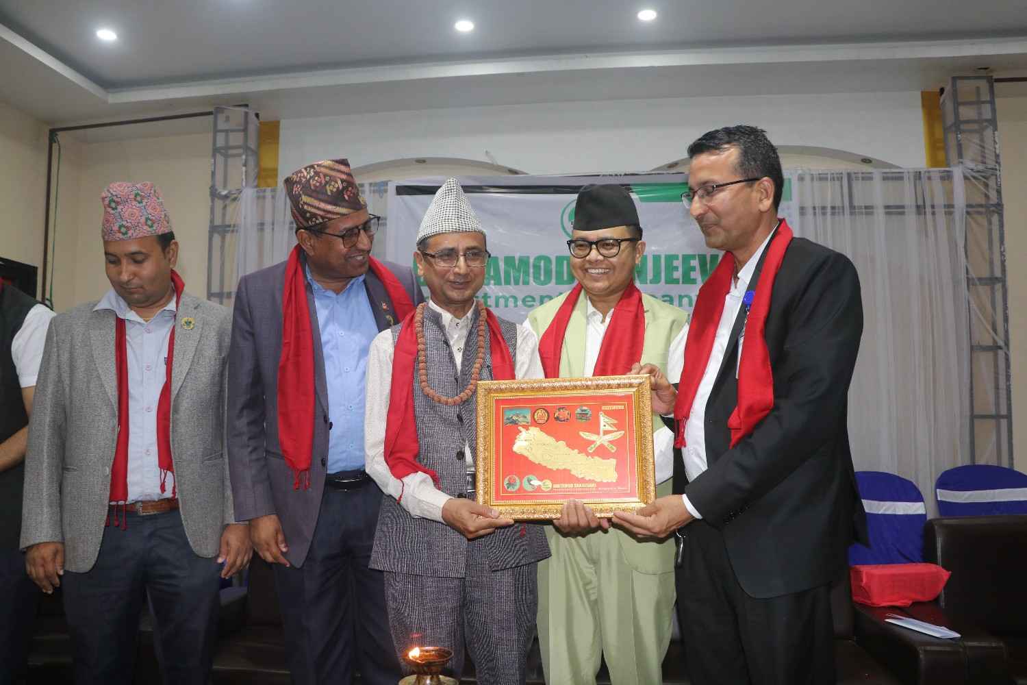 Traditional award presentation with government officials