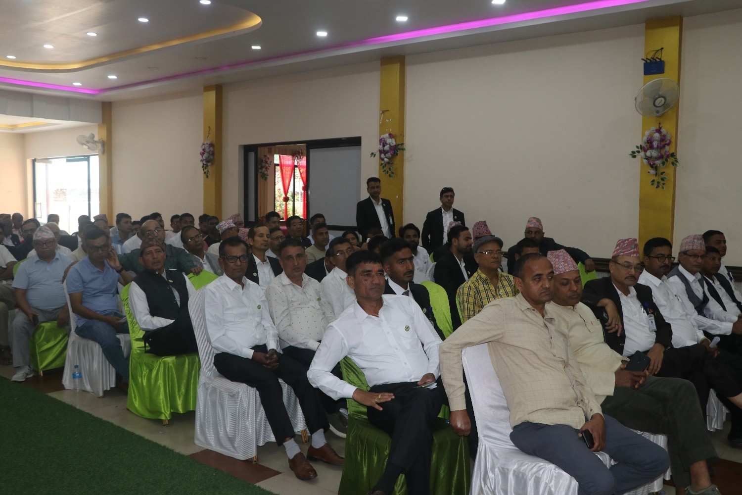 Male dignitaries and community leaders at the event
