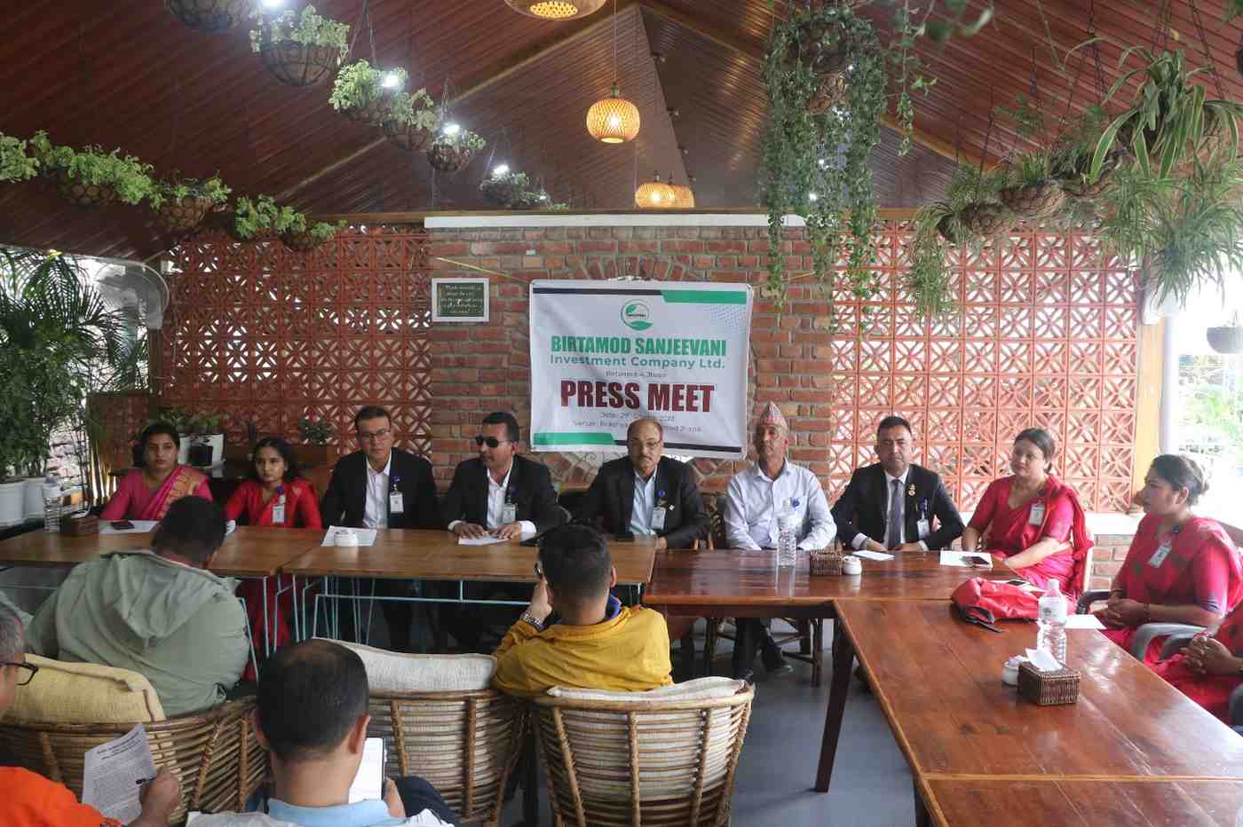 Press conference with company executives and media personnel